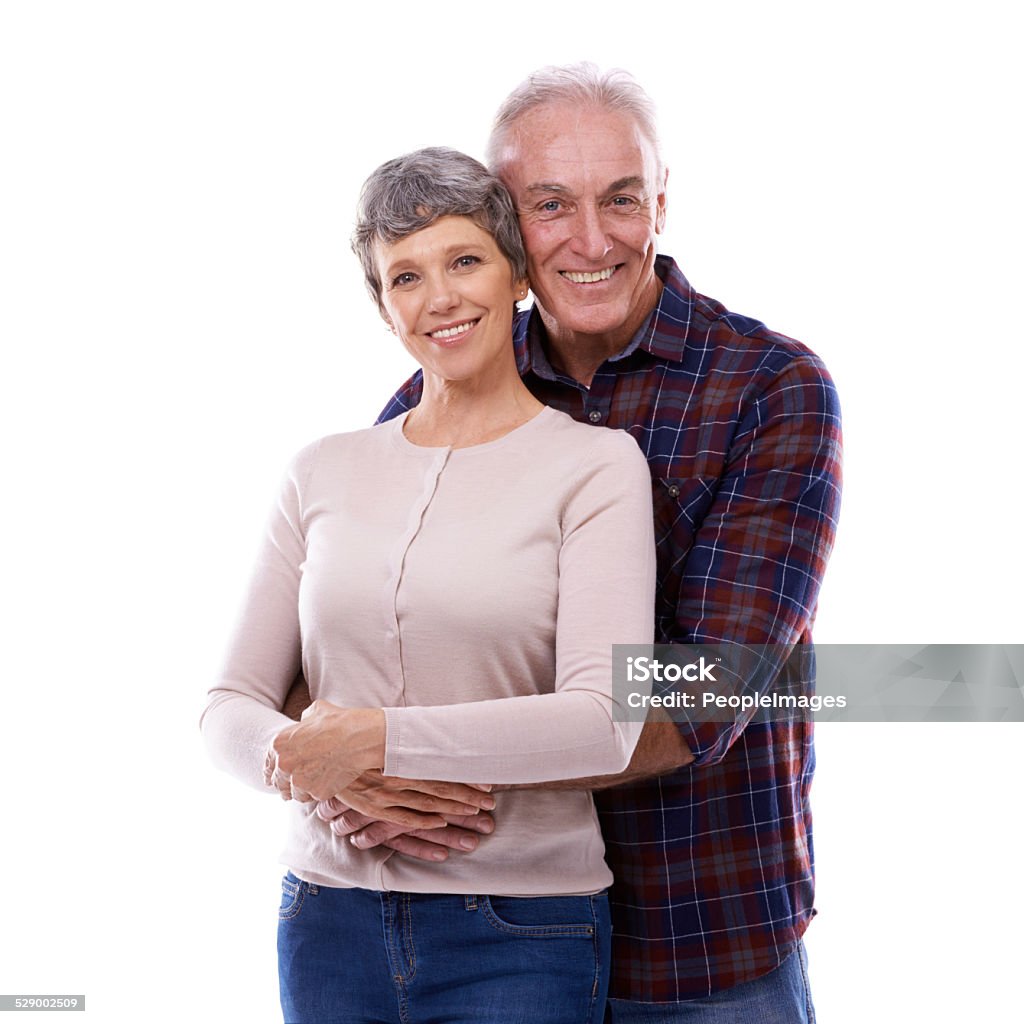 We've been through a lot together Studio portrait of an affectionate elderly couple isolated on white Active Seniors Stock Photo