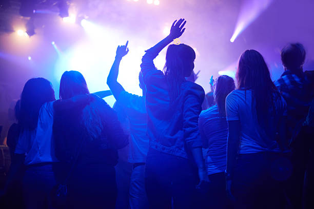 Moved by the music Shot of adoring fans at a rock concert dubstep photos stock pictures, royalty-free photos & images