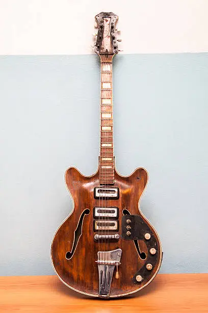 Old electric guitar vertical