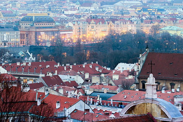 Prague, Czech Republic - November 28, 2014: View Of Prague from the Castle in Hradcany District. Late afternoon in winter, the River Vltava is the citys' main river, Lesser Town borders the near side of the river  with the Old Town and the New Town on the far side of the river.
