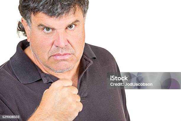 Angry Caucasian Man Making A Fist Stock Photo - Download Image Now - Adult, Anger, Casual Clothing