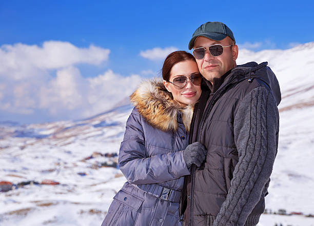 istock Happy family in winter mountains 529008687