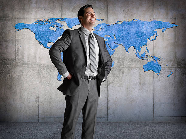 istock Man In Front Of World Map 529024571