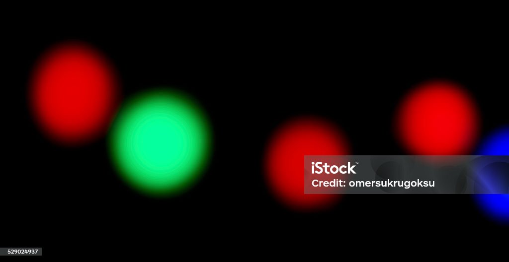 Blurred Lights Defocused color lights on black background. Abstract Stock Photo