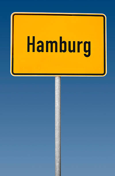 istock Town sign - Hamburg, blue background, cutting path 529027135