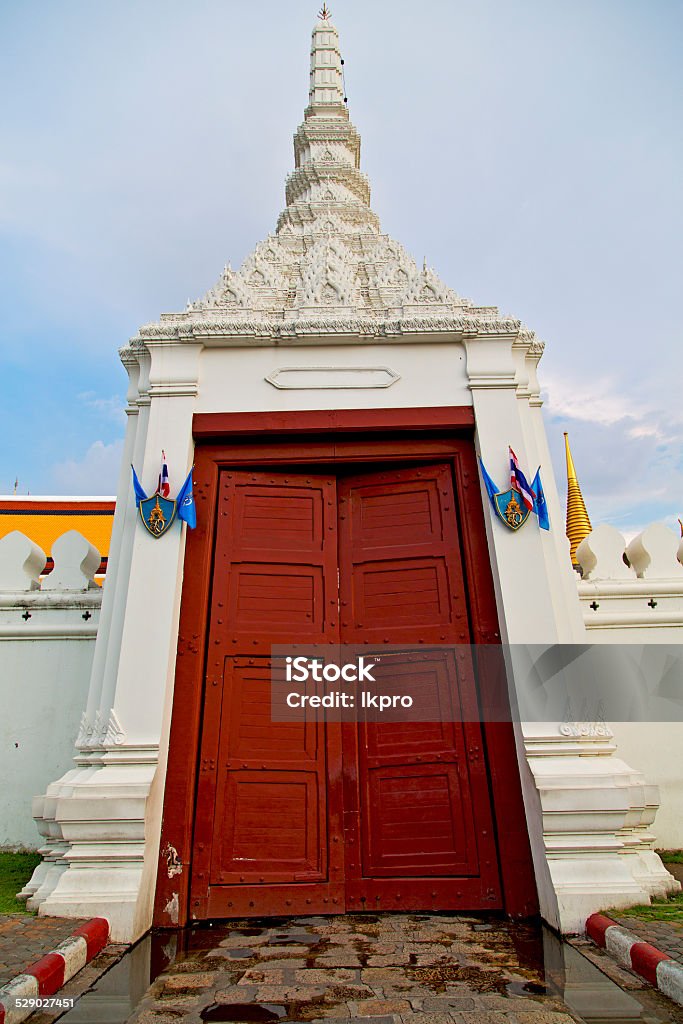 thailand asia   in  bangkok rain  temple pavement flag thailand asia   in  bangkok rain  temple abstract cross colors  roof wat  palaces     sky      and  colors religion      mosaic Abstract Stock Photo