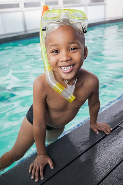 istock Cute little boy wearing snorkel and goggles 529029549