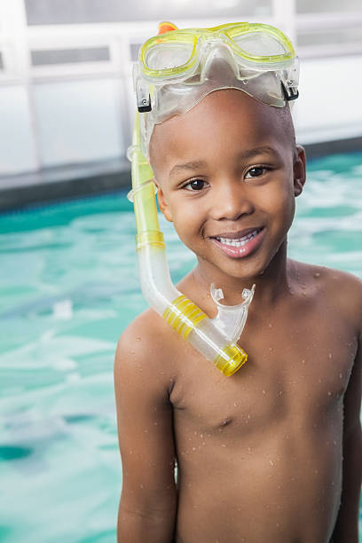 istock Cute little boy wearing snorkel and goggles 529029561