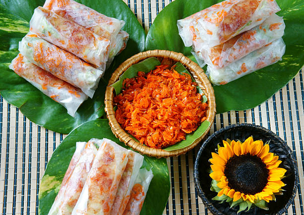 Vietnamese food, bo bia is street food, snack that delicious, cholesterol free, make from dried small shrimp, vegetables, sausage, peanut in rice paper roll, sauce, Bobia is popular snack in Vietnam