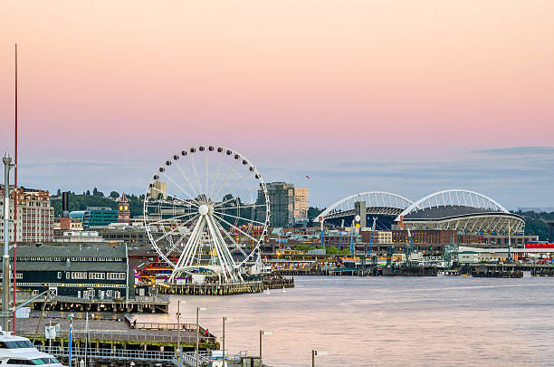 Seattle Waterfront Seattle Watefront at Dusk seattle ferris wheel stock pictures, royalty-free photos & images