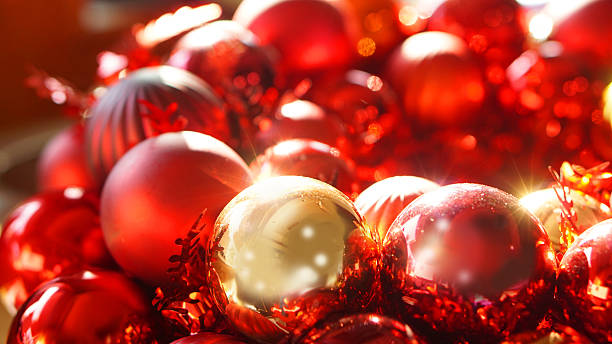 istock red and gold christmas ornaments background 529031691