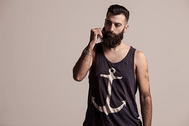 sailor model model with a beard slicked back hair stock pictures, royalty-free photos & images