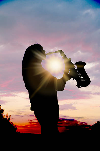 istock girl playing the saxophone 529051342
