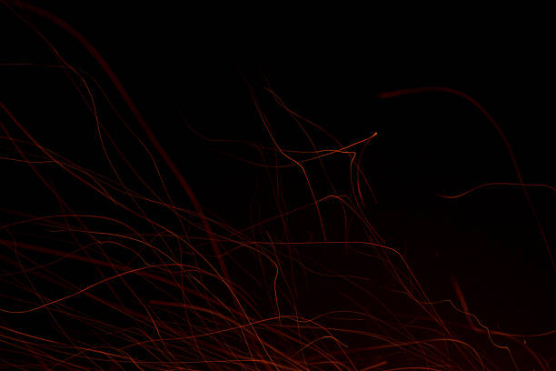 istock Sparks of fire in the dark. 529051362