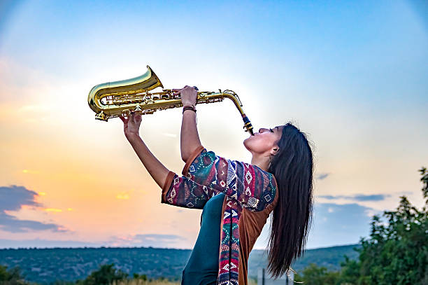 girl playing the saxophone