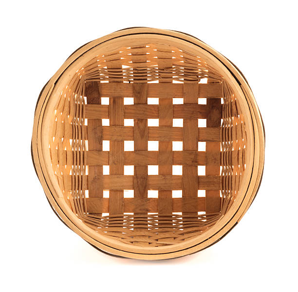 istock Wooden wicker basket isolated over white 529051966