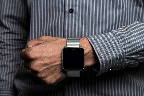 istock Business people use smart watch 529051991