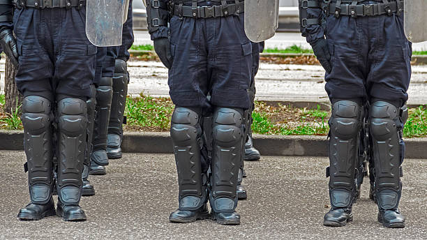 istock Street police forces in alignment 529052743