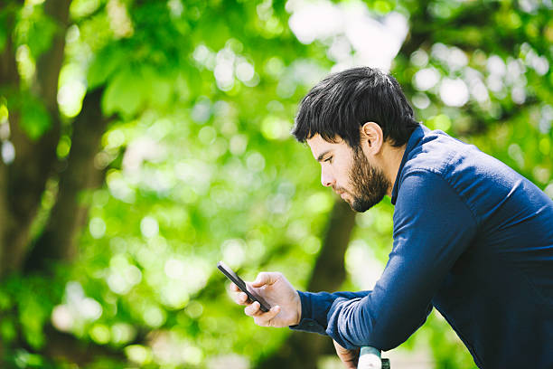 istock Young Handsome Man Checking Events Online While Being Outdoors 529052986