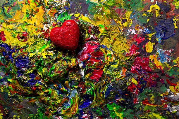 istock Red love heart on colorful artistic palette 529053423