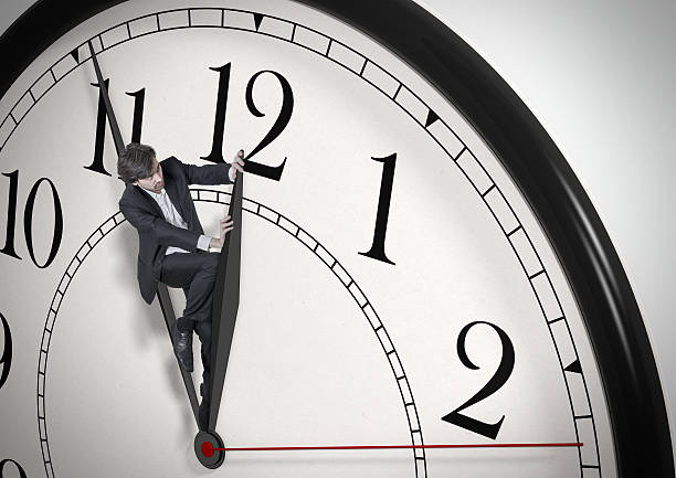 istock Deadline. Businessman trying to stop time. Time Management. 529053835