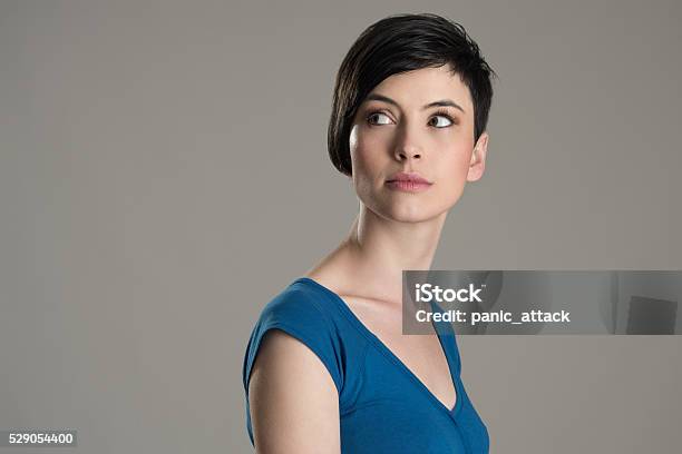 Portrait Of Short Hair Beauty Looking Back Over The Shoulder Stock Photo - Download Image Now