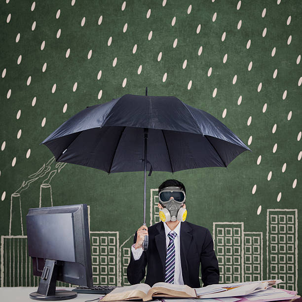 businessperson con sombrilla y máscara - rain wind crisis business fotografías e imágenes de stock