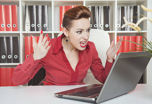 istock Angry screaming business woman working with compute 529054561