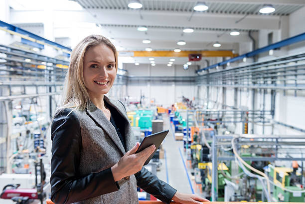 istock Successful female with tablet in futuristic plant 529063824