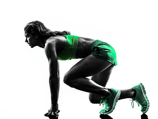 istock woman runner running jogger jogging silhouette 529065573