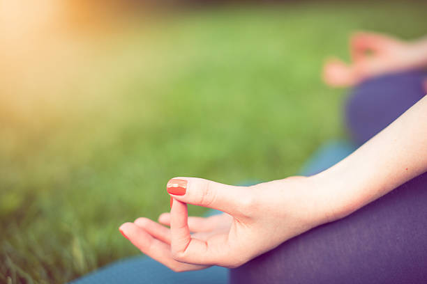 istock Young woman doing yoga 529065662