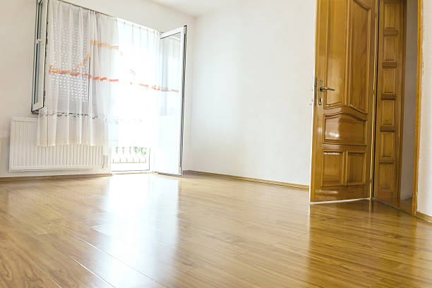 istock empty room with wooden laminate 529066354