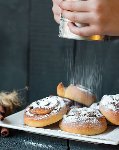 sprinkle with powdered sugar and cinnamon buns, raisins and nuts