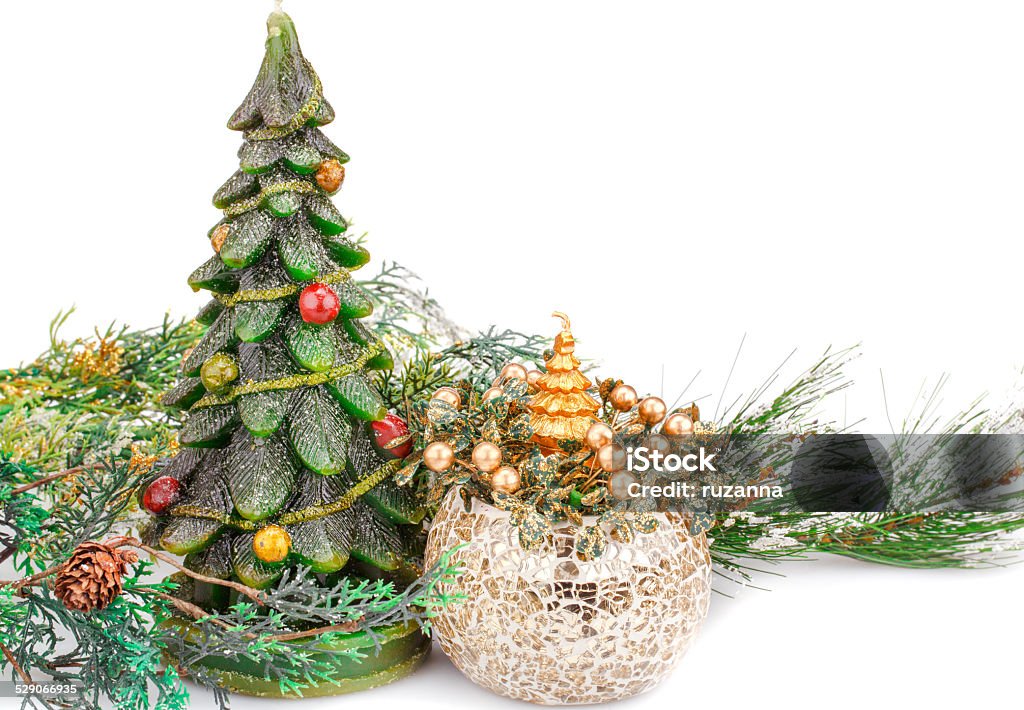 Christmas decoration Fir tree candles and vase on white background. Brown Stock Photo