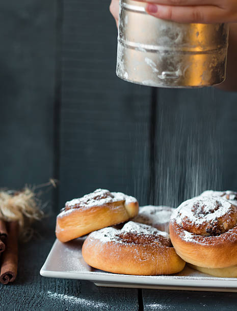 istock sprinkle with powdered sugar and cinnamon buns, raisins and nuts 529067355