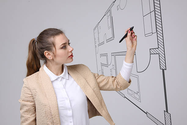 istock Female architect working with a virtual apartment plan 529067420