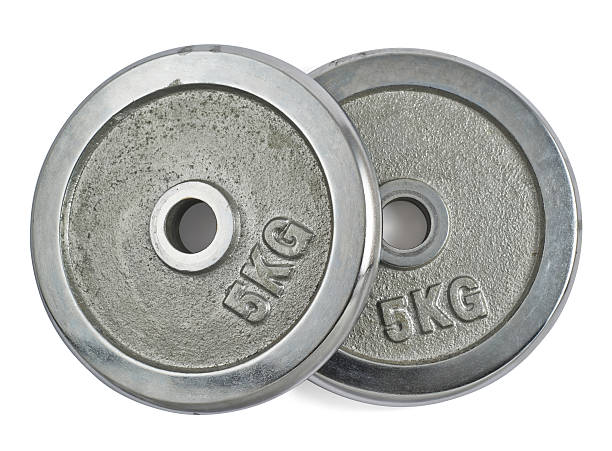 istock Metal barbell plates isolated 529067760