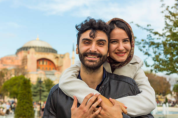 istock Young Muslim Couple at Hagia Sofia, Istanbul, Turkey 529068601