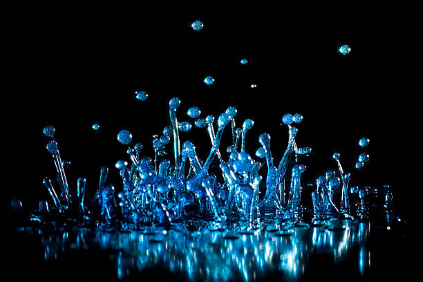 dancing water drops stock photo