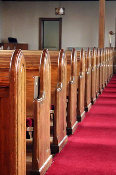 istock Wooden Church Pews 529071021