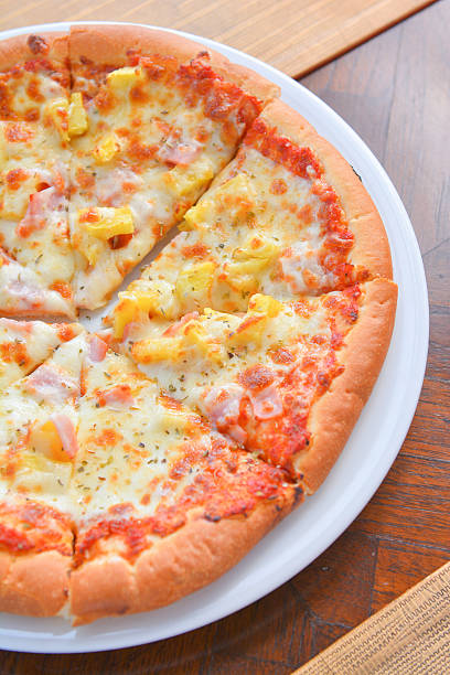 istock Hawiian pizza hot from oven 529071045