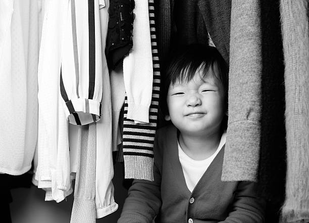 istock Child playing in the closet 529071046