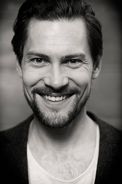 istock Portrait of smiling man, close up 529071894