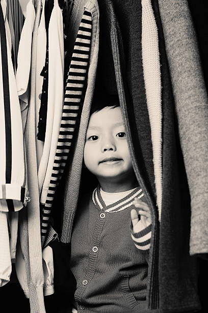istock Child playing in the closet 529072790