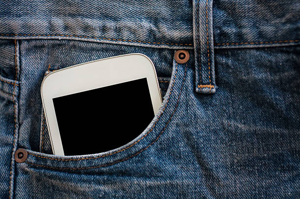 istock mobile phone in jeans pocket with black screen 529075460