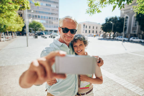 istock Loving senior couple taking a selfie 529075650