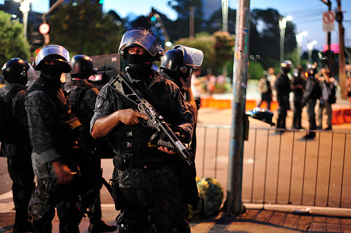 São Paulo, Brazil, January, 09, 2015: Police officers in riot gear during act on Paulista Avenue against the increase in tariffs in urban transport 