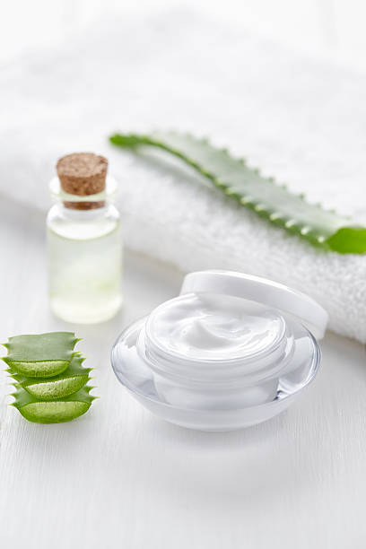 istock Aloe vera cosmetic cream in product container on white background 529076698
