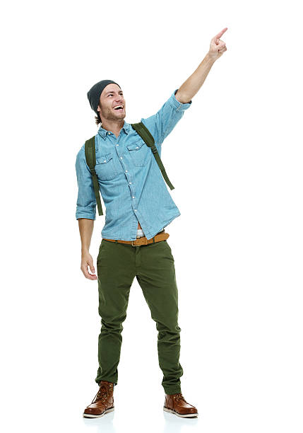 istock Cheerful hipster pointing away 529078369