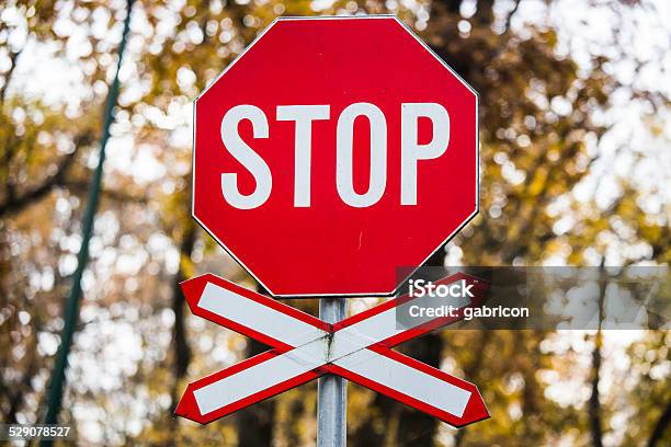 Red Stop Sign With Crossing Sign Stock Photo - Download Image Now - Cross Shape, Enacting, Horizontal